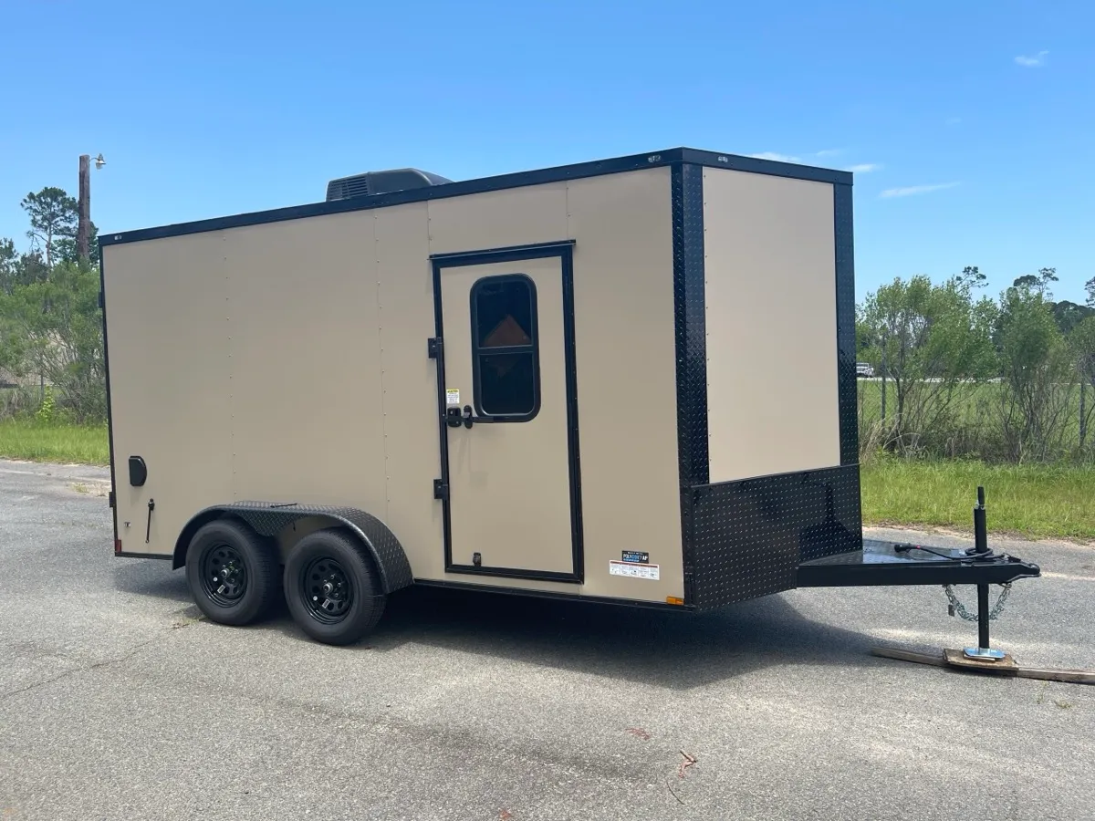 Enclosed cargo trailer with side door and dual axle