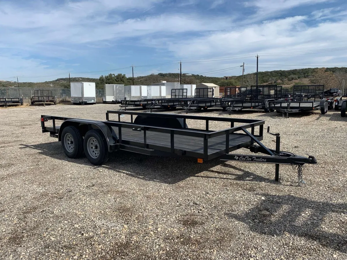 Utility trailer with steel frame and mesh ramp gate